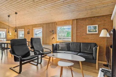 a living room with a couch and chairs and a table at 318-Thisted-Nordsovej-204-A in Thisted