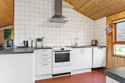 a kitchen with white appliances and a window at 318-Thisted-Nordsovej-204-A in Thisted