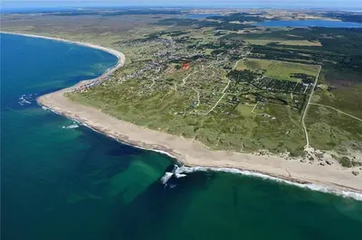 an aerial view of an island in the ocean at 970-Thisted-Klitstien-47 in Torsted