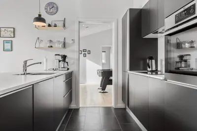 a kitchen with a sink and a counter top at 105-Thisted-Gronkaervej-19-B in Thisted