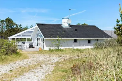 a white house with a solarium on top of it at 314-Thisted-Mose-Bollevej-14 in Thisted