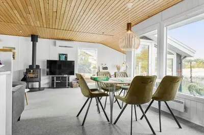 a dining room with a table and chairs at 837-Thisted-Flyndervej-17 in Thisted