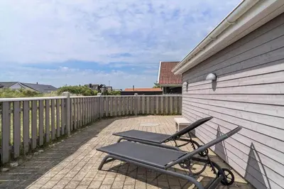 a pair of chairs sitting on a patio at 514-Thisted-Fiskervej-53 in Thisted