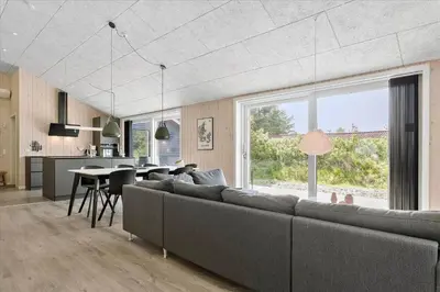 a living room with a couch and a table at 171-Thisted-Molgaardsvej-71 in Thisted