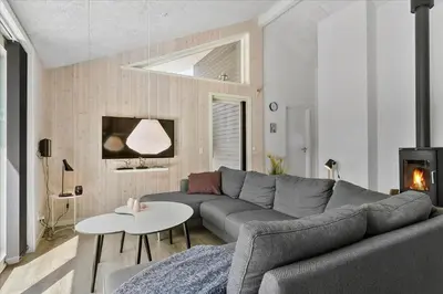 a living room with a couch and a table at 171-Thisted-Molgaardsvej-71 in Thisted