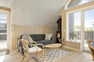 a living room with a couch and a table at 842-Thisted-Orredvej-40 in Thisted
