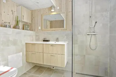 a bathroom with a sink and a shower at 842-Thisted-Orredvej-40 in Thisted