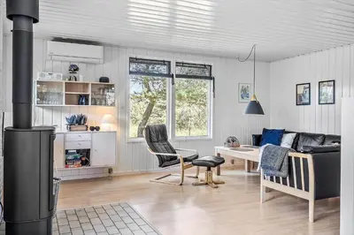 a living room with a couch and a table at 191-Thisted-Bredkaervej-61 in Thisted