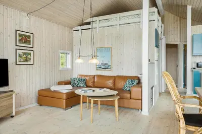 a living room with a couch and a table at 248-Thisted-Molgaardsvej-28 in Thisted