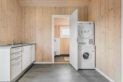a kitchen with a washer and dryer in a room at 123-Thisted-Orredvej-30 in Thisted