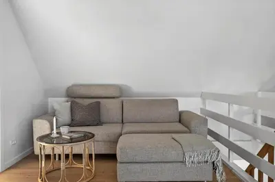 a living room with a couch and a table at 1313-Thisted-Hotelvej-4 in Thisted