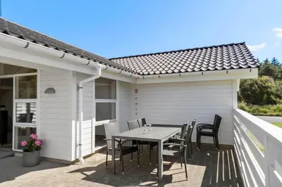 a table and chairs on the patio of a house at 878-Thisted-Smedevej-15 in Thisted
