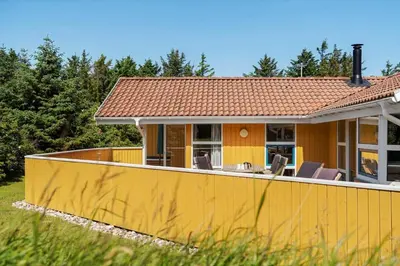 a house with a yellow fence in front of it at 233-Thisted-Tunvej-5 in Thisted
