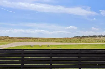 two sheep grazing in a field behind a fence at 699-Thisted-Sotungevej-33 in Thisted