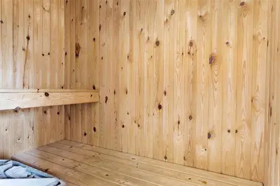 a wooden paneled wall of a sauna at 802-Thisted-Pighvarvej-22 in Thisted