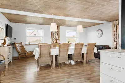 a kitchen and dining room with a table and chairs at 600-Vestervig-Krik-Strandvej-100 in Vestervig