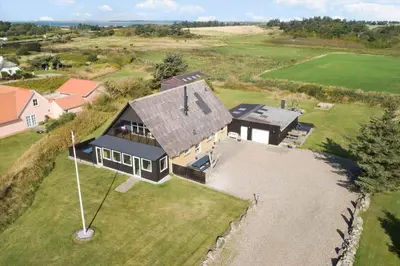 an aerial view of a house with a roof at 600-Vestervig-Krik-Strandvej-100 in Vestervig
