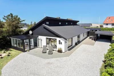 an overhead view of a white building with a black roof at 650-Thisted-Orredvej-9-A in Thisted