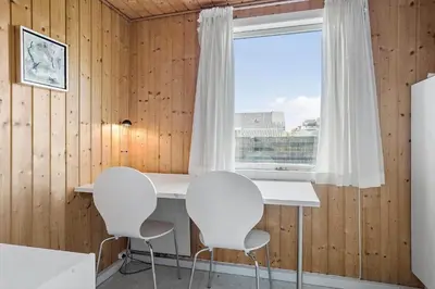 a room with two white chairs and a window at 790-Thisted-Nordsovej-90 in Thisted