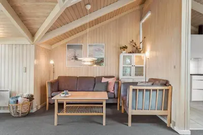 a living room with a couch and a table at 772-Thisted-Hummervej-6 in Thisted