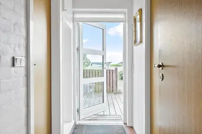 an open door with a view of a balcony at 685-Thisted-Pighvarvej-28 in Thisted