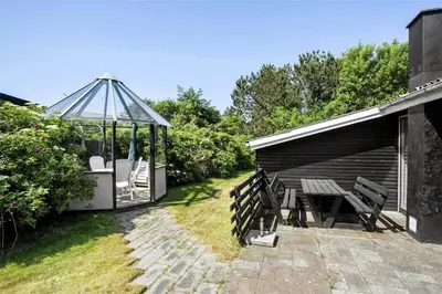 a patio with a gazebo and a picnic table at 982-Thisted-Clemmessti-16 in Torsted