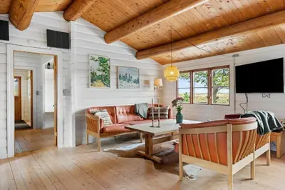 a living room with a couch and a tv at 1307-Bedsted-Thy-Nordre-Redningsvej-4 in Bedsted Thy