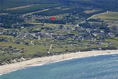 an aerial view of a beach with a bunch of houses at 940-Thisted-Spanggardsvej-45 in Torsted