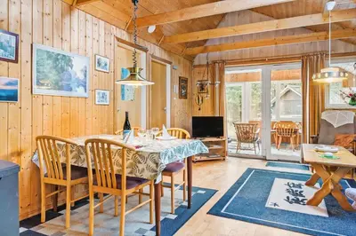 a dining room with a table and chairs at 749-Thisted-Nordsovej-214 in Thisted