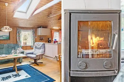 a kitchen and a living room with a stove at 749-Thisted-Nordsovej-214 in Thisted