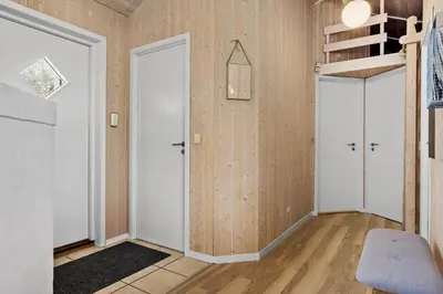 a room with two white doors and a staircase at 709-Thisted-Muslingevej-2 in Thisted