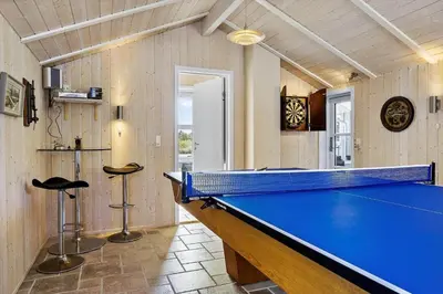 a pool table in a room with a ping pong ball at 709-Thisted-Muslingevej-2 in Thisted