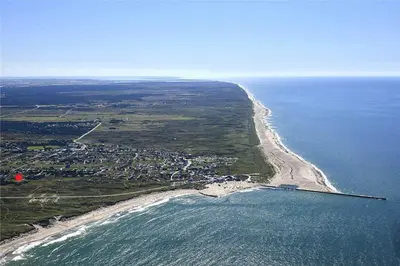 an aerial view of a beach and the ocean at 709-Thisted-Muslingevej-2 in Thisted