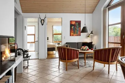 a living room with a table and a couch at 490-Snedsted-Niels-Juels-Vej-39 in Snedsted