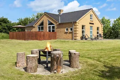 a fire pit in a yard in front of a house at 490-Snedsted-Niels-Juels-Vej-39 in Snedsted
