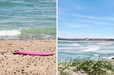 a pink surfboard laying on the beach next to the ocean at 1039-Thisted-Niels-Vognmands-Vej-19 in Torsted