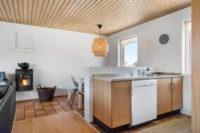 a kitchen with a sink and a stove at 234-Thisted-Kuttervej-9 in Thisted