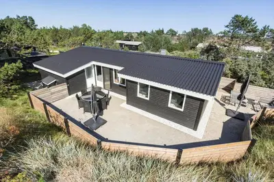 an overhead view of a house with a large deck at 511-Thisted-Blabaervej-16 in Thisted