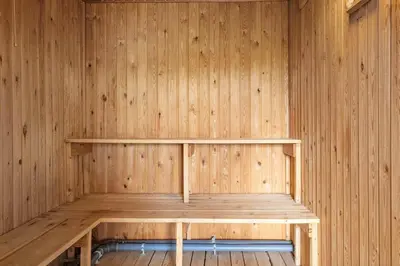 an empty sauna with wooden walls and wooden shelves at 942-Thisted-Orhagevej-183 in Torsted