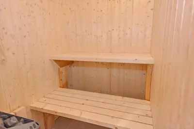 a wooden sauna with a wooden shelf in it at 167-Thisted-Vesterhavsgade-158 in Thisted