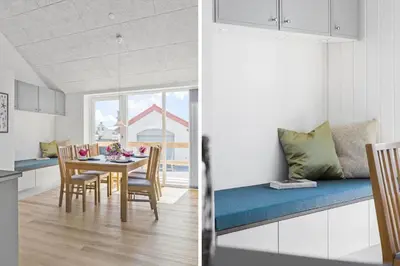 a kitchen and a dining room with a table and chairs at 167-Thisted-Vesterhavsgade-158 in Thisted