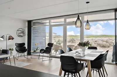 a dining room with a table and chairs at 774-Thisted-Havstokken-26-A in Thisted