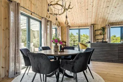 a dining room with a table and chairs at 157-Thisted-Isfuglevej-17 in Thisted