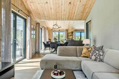 a living room with a couch and a table at 157-Thisted-Isfuglevej-17 in Thisted