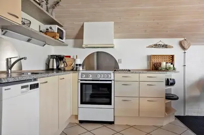 a kitchen with a stove and a white oven at 332-Thisted-Kristinesvej-32 in Thisted