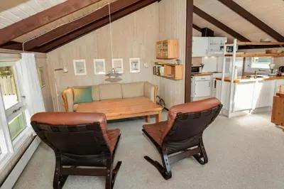 a living room with a couch and two chairs at 829-Thisted-Nordsovej-188 in Thisted