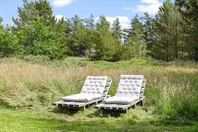two chairs sitting in the middle of a field at 1028-Thisted-Tingbakken-28 in Torsted