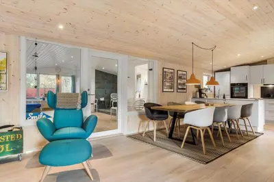 a kitchen and dining room with a table and chairs at 1028-Thisted-Tingbakken-28 in Torsted