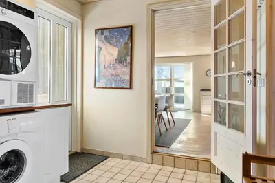 a laundry room with a washer and dryer at 870-Thisted-Nordsovej-34 in Thisted