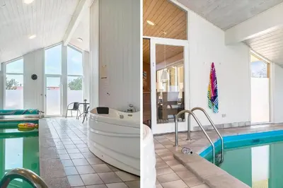 a bathroom with a tub and a swimming pool at 209-Vestervig-Isfuglevej-15 in Vestervig
